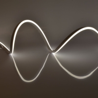 Светодиодная гибкая герметичная лента Uniel ULS-N21-2835-120LED-m-8mm-IP67-220V-8W-m-50M-4000K Uniel ULS-N21-2835-120LED/m-8mm-IP67-220V-8W/m-50M-4000K бобина UL-00013354