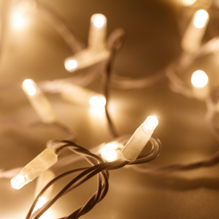 Гирлянда светодиодная декоративная ARD-STRING-CLASSIC-10000-WHITE-100LED-STD WARM (230V, 7W) (ARDCL, IP65) Arlight 025809