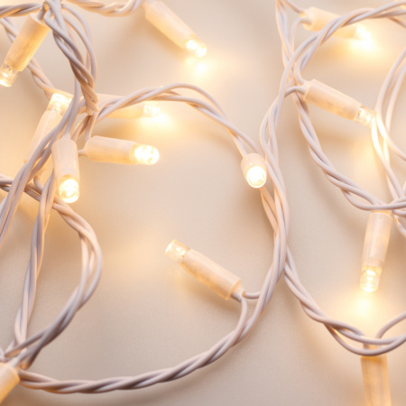 Гирлянда светодиодная декоративная ARD-STRING-CLASSIC-10000-WHITE-100LED-STD WARM (230V, 7W) (ARDCL, IP65) Arlight 025809